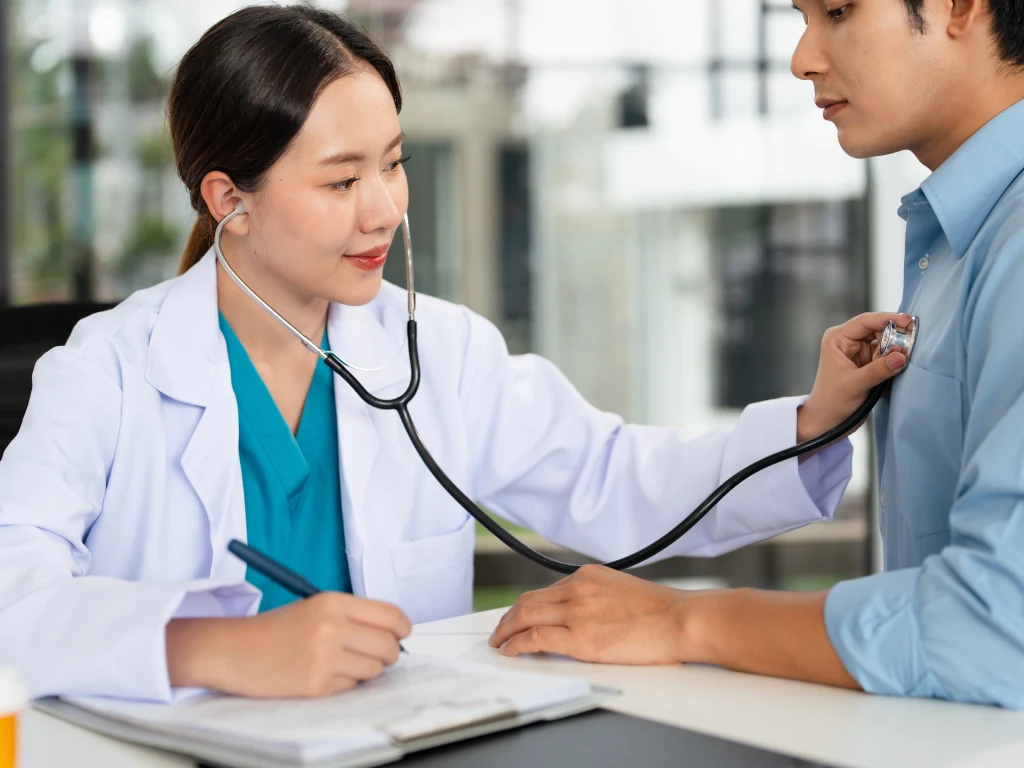 Doctor consultation during GP clinic health screening in Singapore